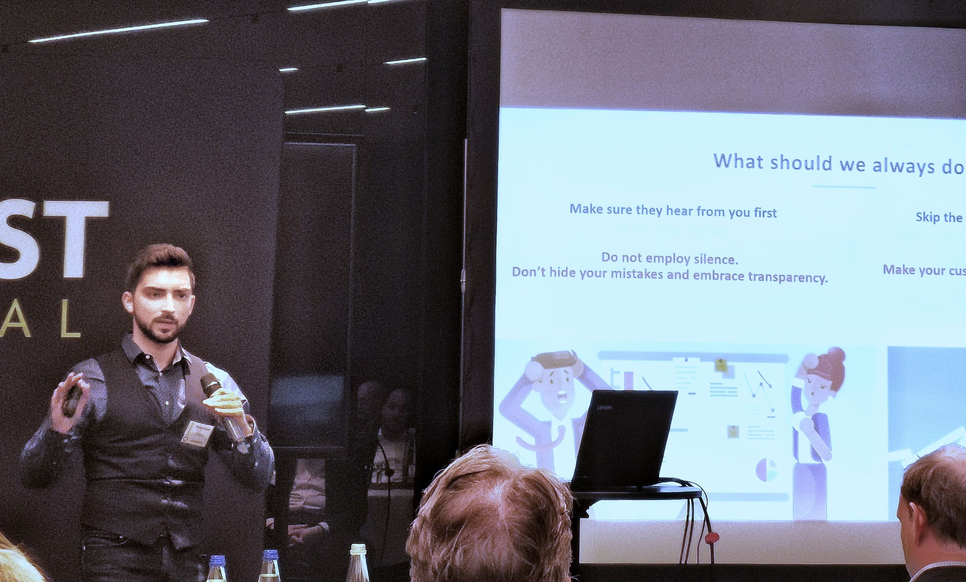 Branko Džakula presenting a slide on transparency to a conference audience.